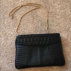 Adorable black purse with gold chain strap